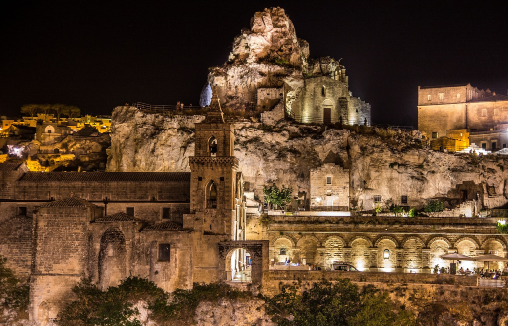 View of Matera's Sassi during the Grand Tour, including Sasso Caveoso, Sasso Barisano, and historic churches